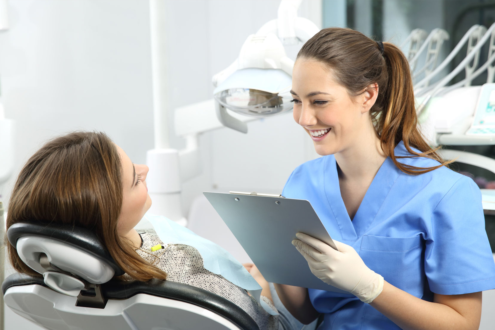 Little girl visiting dentist Little girl sitting in the dentists office